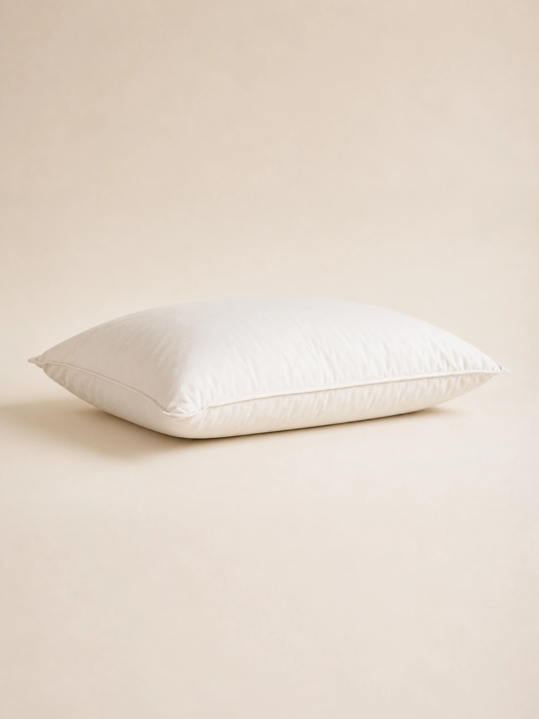 Cloud Nine Pillow shown from the side with its full structured loft visible.