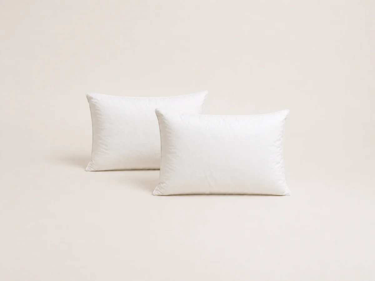 Two Pure Down Pillows shown together for scale.